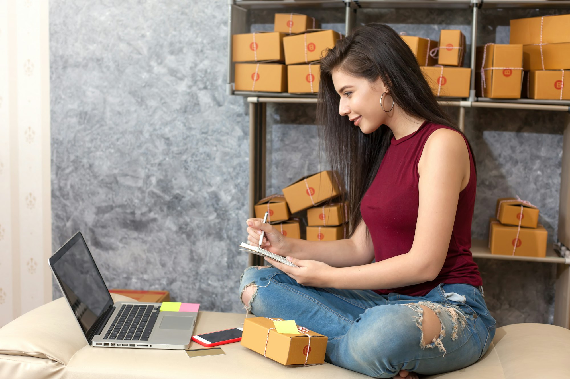 Online business. Beautiful young woman business owner about online business. Successful and happy