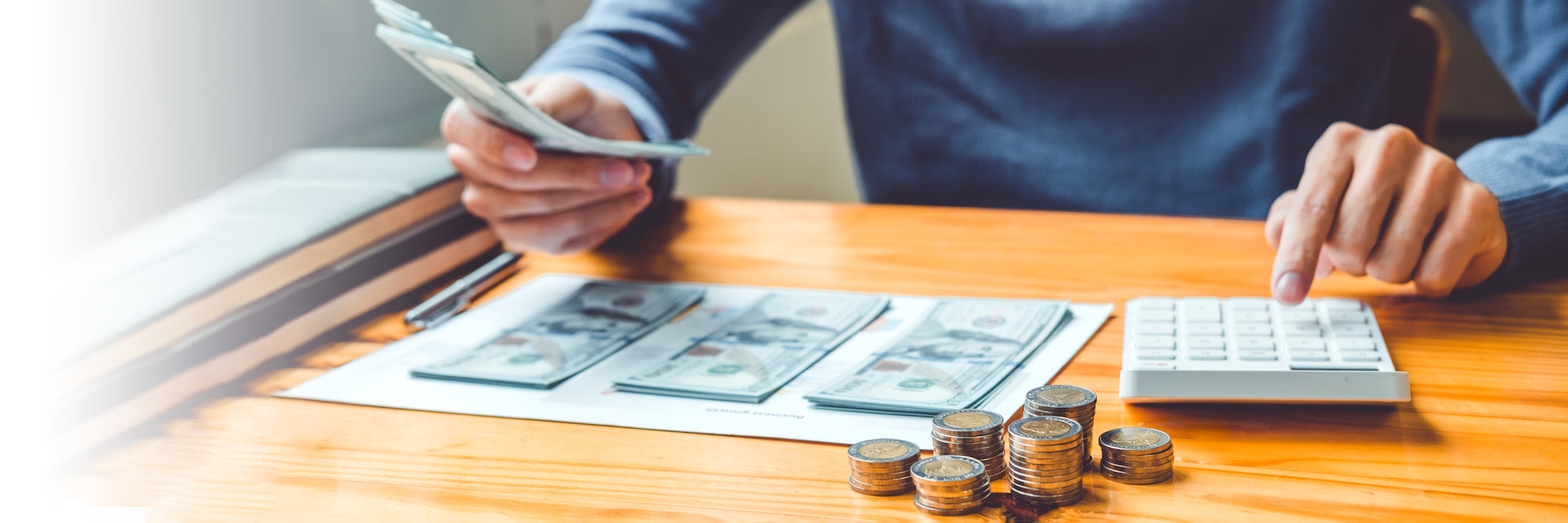 Saving money concept Man hand putting Row and coin stack growing business